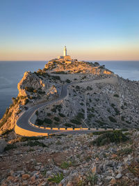 Scenic view of lighthouse of cap de formentor on majorca mallorca at sunset against sky