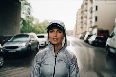 Portrait of young woman in car