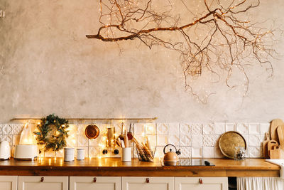 The interior of a christmas decorated kitchen in the loft style in a cozy house