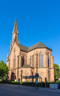 Exterior of historic building against clear blue sky