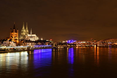 Illuminated city lit up at night