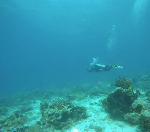 Man swimming in sea