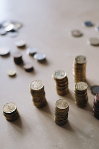 High angle view of coins on table