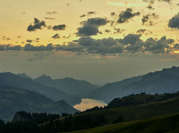 Scenic view of landscape against sky during sunset