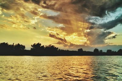 Scenic view of sea at sunset