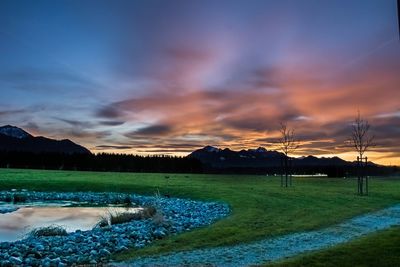 Scenic view of landscape at sunset