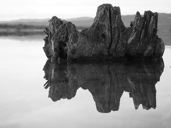 Reflection of sky in puddle