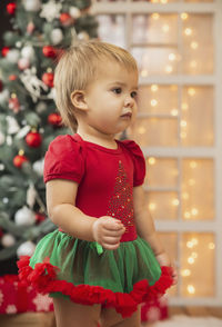 Portrait of cute girl looking away
