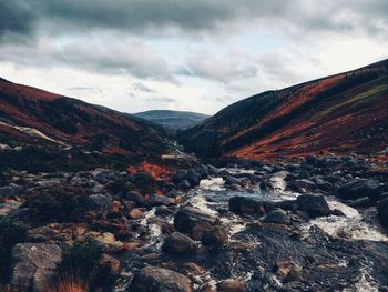 Scenic view of rocky mountains against sky