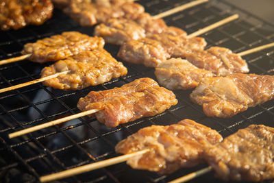 Close-up of meat on barbecue grill