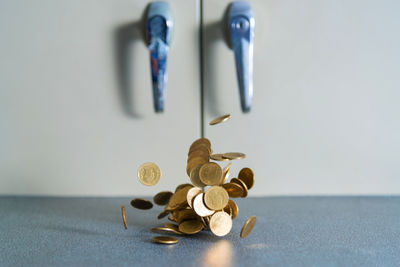 Close-up of coins on table