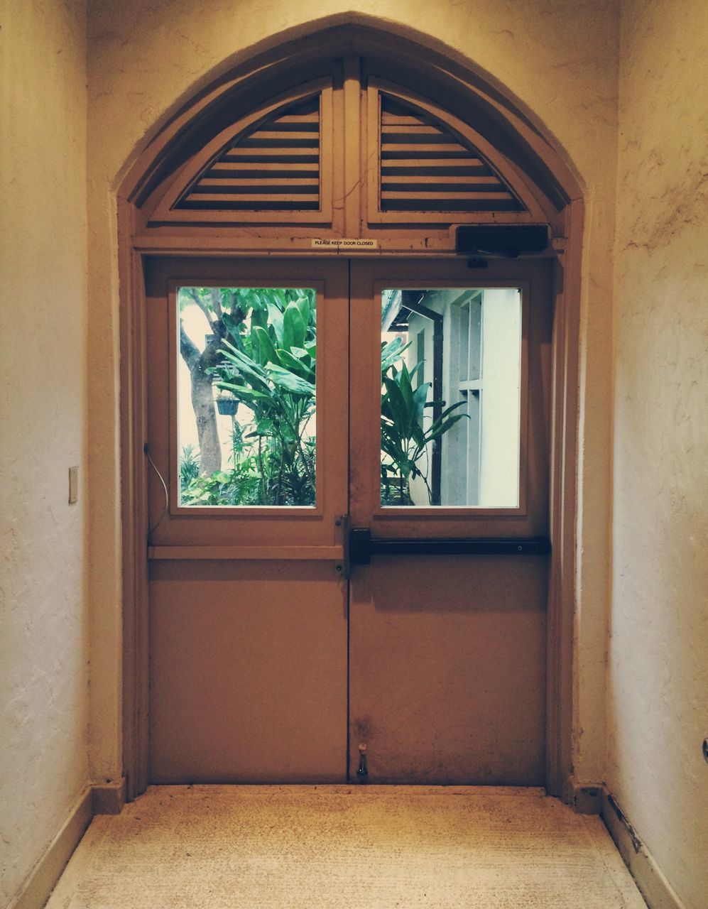 window, architecture, indoors, door, built structure, arch, house, closed, glass - material, entrance, open, building exterior, transparent, day, tree, potted plant, plant, no people, doorway, window sill