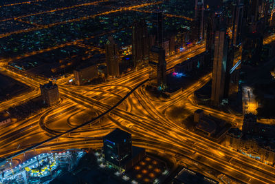 Aerial view of light trails on highway at night