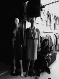 Portrait of friends standing at store