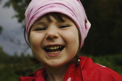 Close-up portrait of a smiling girl