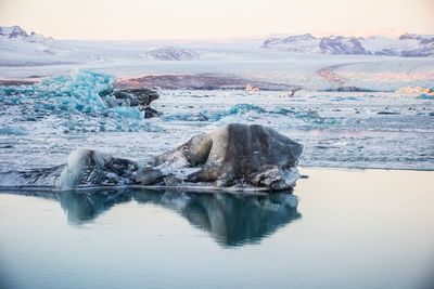 Scenic view of frozen sea against sky