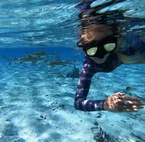 Close-up of woman swimming in sea