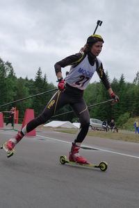 Full length of woman skating on road