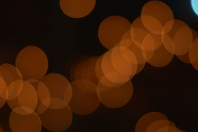 Defocused image of illuminated lights at night