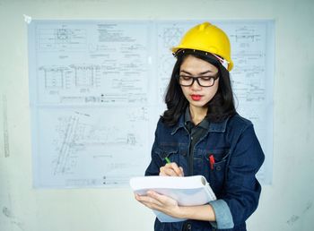 Woman working with mobile phone