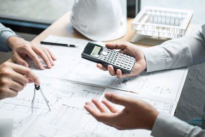 High angle view of man working on table