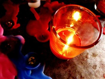 Close-up of illuminated tea light candle