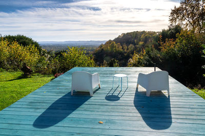 Deck chairs against the south downs landscape in autumn, hampshire, england 