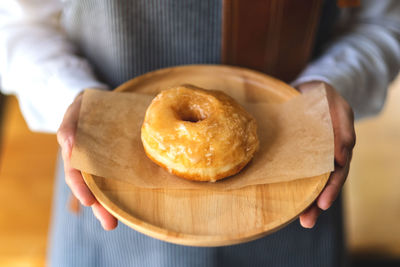 Close-up of hand holding bread