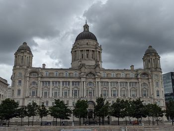 View of historic building against cloudy sky