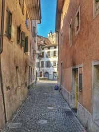 Alley amidst buildings in town