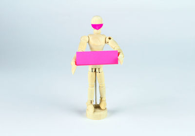 Close-up of toy against white background