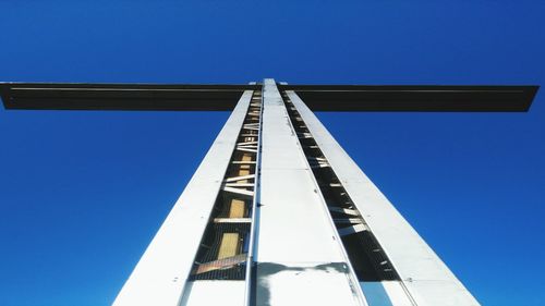 Low angle view of built structure against blue sky