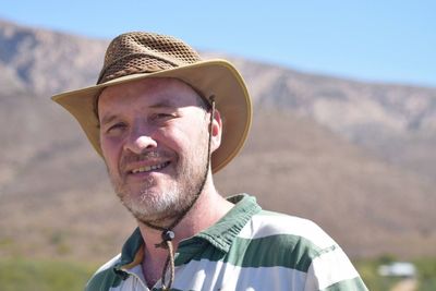 Portrait of man wearing hat