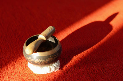 High angle view of glass container on table