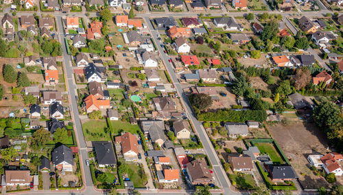 High angle view of street amidst buildings in town