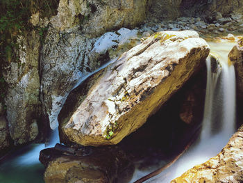 High angle view of rocks in sea