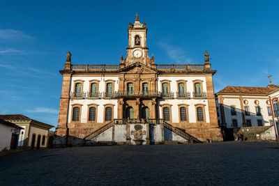View of historic building against blue sky