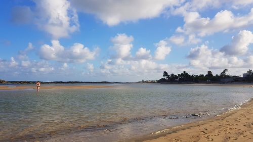 Panoramic view of beach against sky