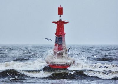 Frozen beacon at the baltic sea in gdynia