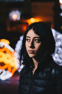 Portrait of young woman with eyes closed