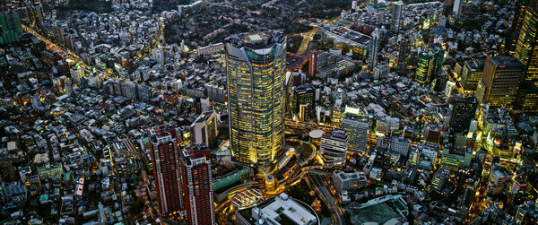 High angle view of illuminated buildings in city