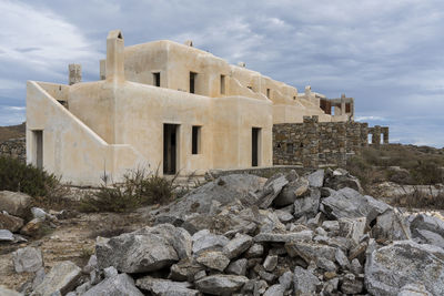 Old building against cloudy sky