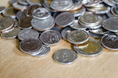 High angle view of coins on table