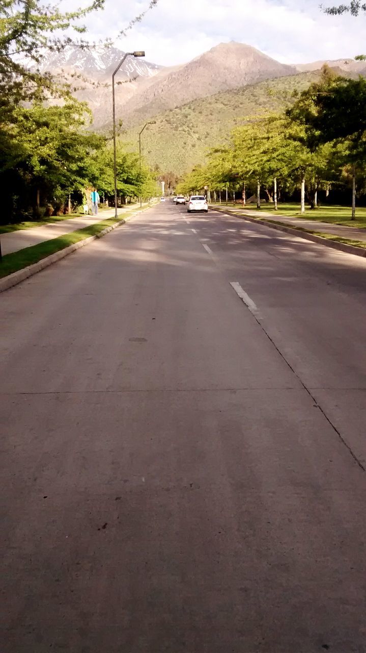 the way forward, transportation, road, diminishing perspective, tree, mountain, vanishing point, country road, empty road, sky, asphalt, road marking, street, tranquil scene, empty, tranquility, landscape, mountain range, long, nature