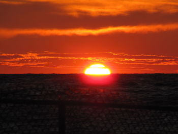 Scenic view of sea at sunset