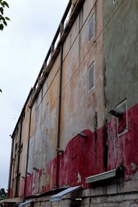 Low angle view of old building against sky