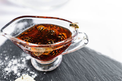 Close-up of tea in glass on table