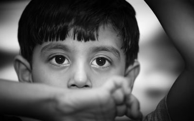 Close-up portrait of innocent boy