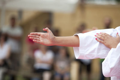 Cropped image of woman practicing karate