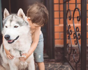 Full length of man with dog
